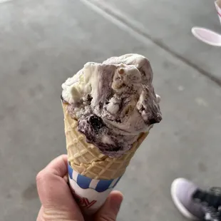 Blueberry Cheesecake Ice Cream in waffle cone