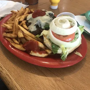 Mushroom Swiss Burger with fries.