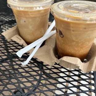 two cups of coffee on a table