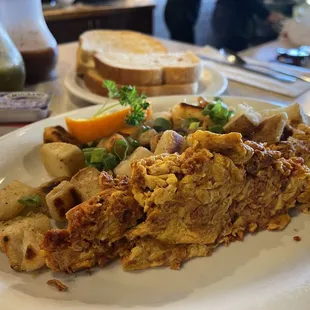Chorizo scramble with potatoes and toast. Yum!