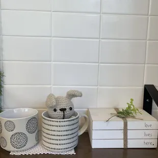 a teddy bear in a mug