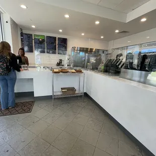 a woman standing at the counter