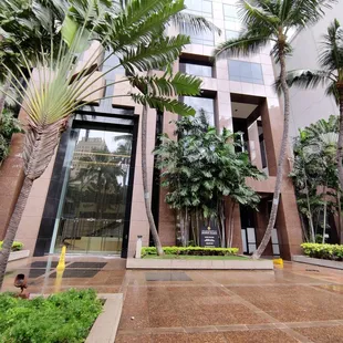 Enter this building. Security will buzz the door open for you.