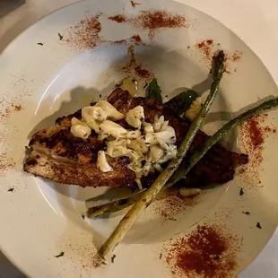 Blackened red-drum with crabmeat and veggies
