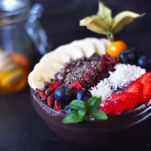 Açaí (ah-sigh-ee)bowl. These are parfaits on tropical, chilled steroids. Blended organic frozen açai, topped with granola and fruits.