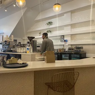 a man standing at the counter