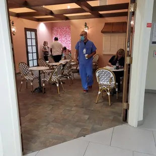 a woman in a blue scrub suit