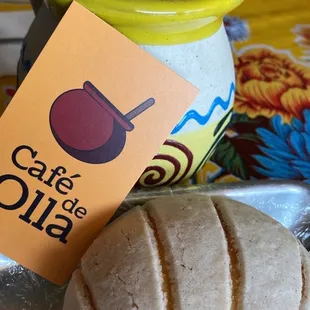 a loaf of bread and a cup of coffee