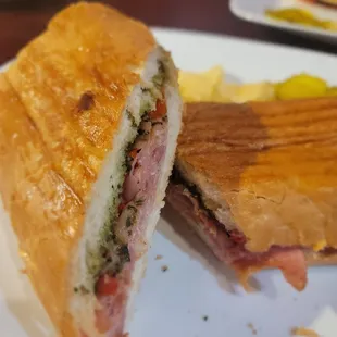 a cut in half sandwich on a plate