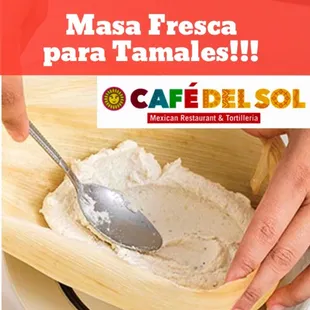 a person scooping into a bowl