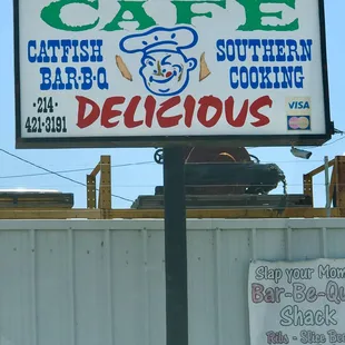 Cafe Delicious sign in parking lot