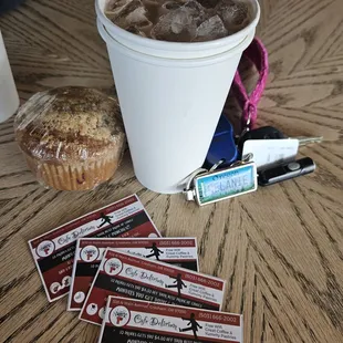 a cup of coffee and a muffin