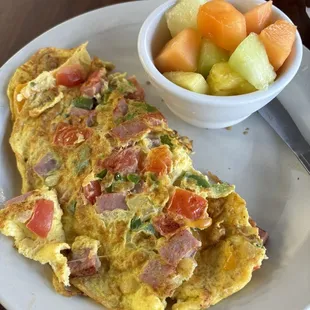 Western Omelet with cup of fruit.