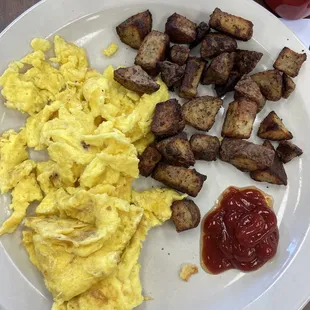 Side of 2 eggs and potatoes