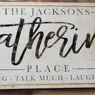 a sign for the jacksons gathering place