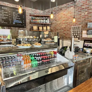 a counter with a variety of drinks