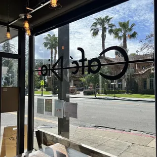 a view of a street through a window