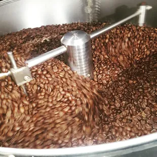 Roasting a fresh batch of coffee in our roastery.  YUM!