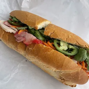 Dolci favorite Banh Mi - fully loaded with vegetables and 9. BBQ Pork Belly