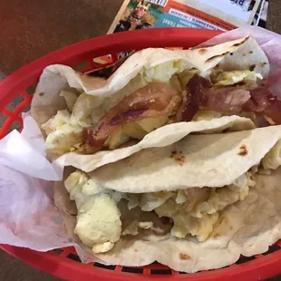 Breakfast tacos - bacon/egg and potato/egg. Homemade tortillas made it a-mazing.