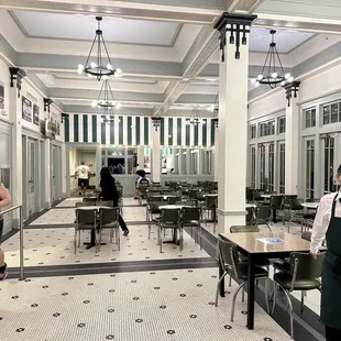 a man standing in a restaurant