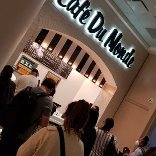 customers waiting in line at the counter