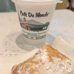 a pastry and a cup of coffee