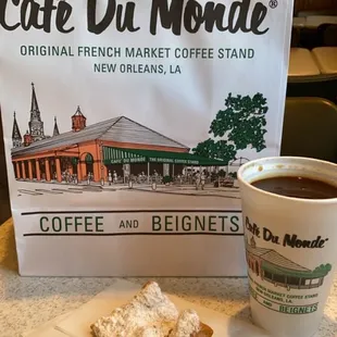 a cup of coffee and a pastry