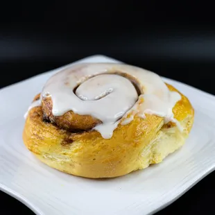 Cinnamon buns topped with sweet icing