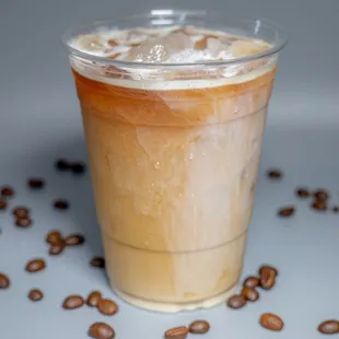Iced latte with various flavors: vanilla, hazelnut, caramel, almond Rocha, honey nut