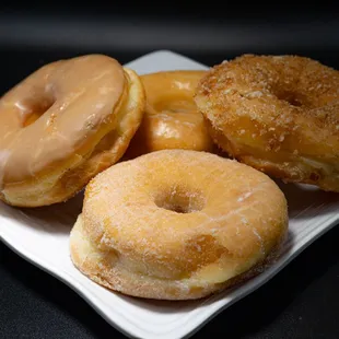 Maple, Glazed, cinnamon crumb, and sugar donuts