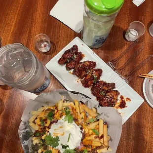 a plate of fries and a salad