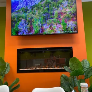 a flat screen tv mounted on the wall
