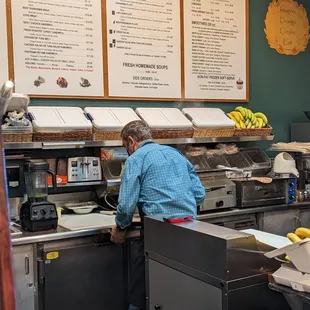 a man working in a restaurant kitchen
