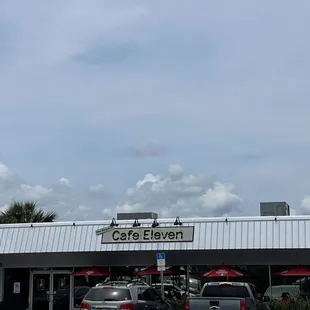 cars parked in front of the restaurant