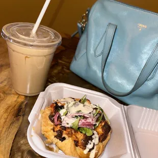 a bag and a sandwich on a table