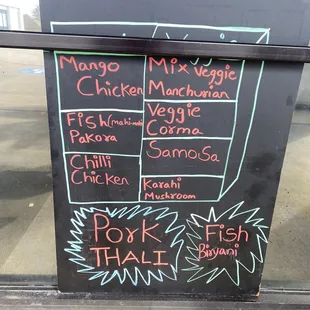 a menu written on a blackboard