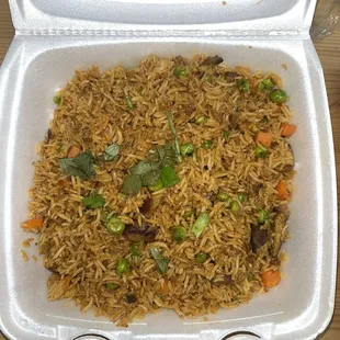 Combination fried rice- spectacular flavor- fresh herbs and they don&apos;t skimp on protein or flavor.
