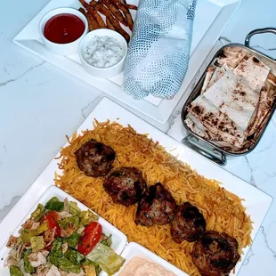Everything we had, very good Lamb Kofta Kabob Platter Lamb Shawarma Roll Up