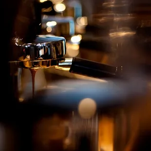 coffee being poured into a cup