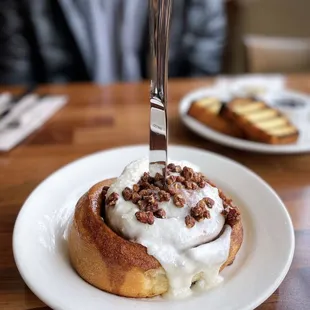 Cinnamon Roll | cream cheese frosting &amp; maple toasted pecans