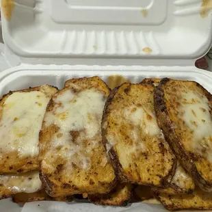 Baked potatoes w cheese and butter