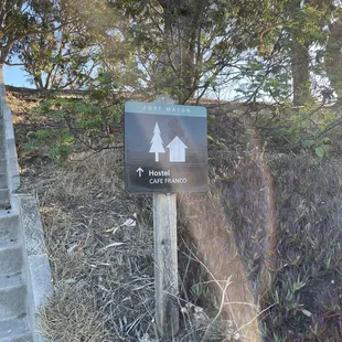 a sign on the side of the road