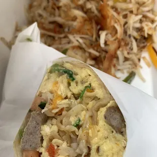 a breakfast burrito and a plate of food