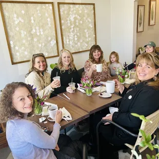 a group of women sitting at a table