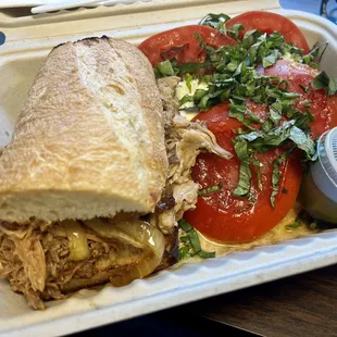 1/2 pulled pork adobo sandwich 1/2 tomato mozzarella salad, all for less than $11 and delicious!