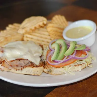 Smoked turkey melt on a toasted jalapeño bun. You need one of these for your very own.
