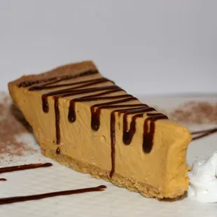 Dulce de leche cheesecake
Creamy cheesecake and rich dulce de leche topped with chocolate sauce.