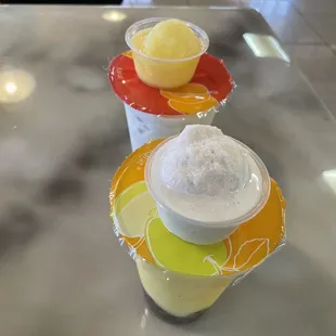 an horchata blended drink and a pineapple slush with boba!