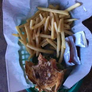 This was $8.03 for half a grilled cheese and some previously frozen and then fried shoe string fries.